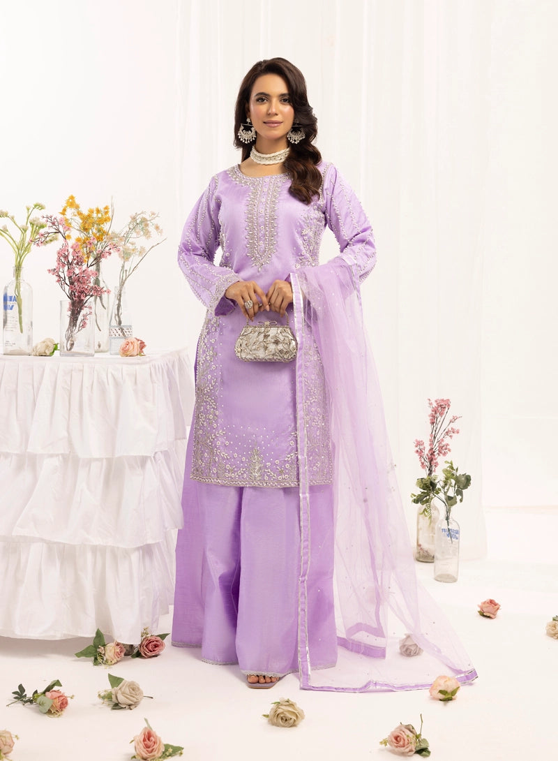 Woman in a lavender traditional outfit with a white background