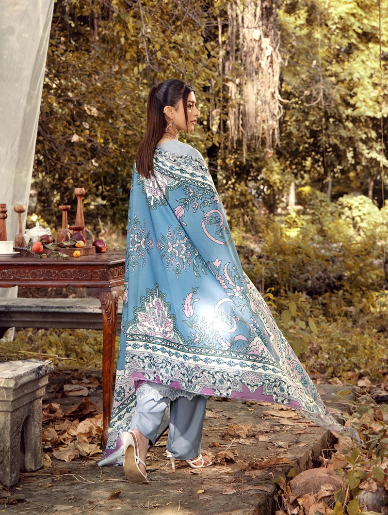 Woman in a floral dress standing in a garden setting