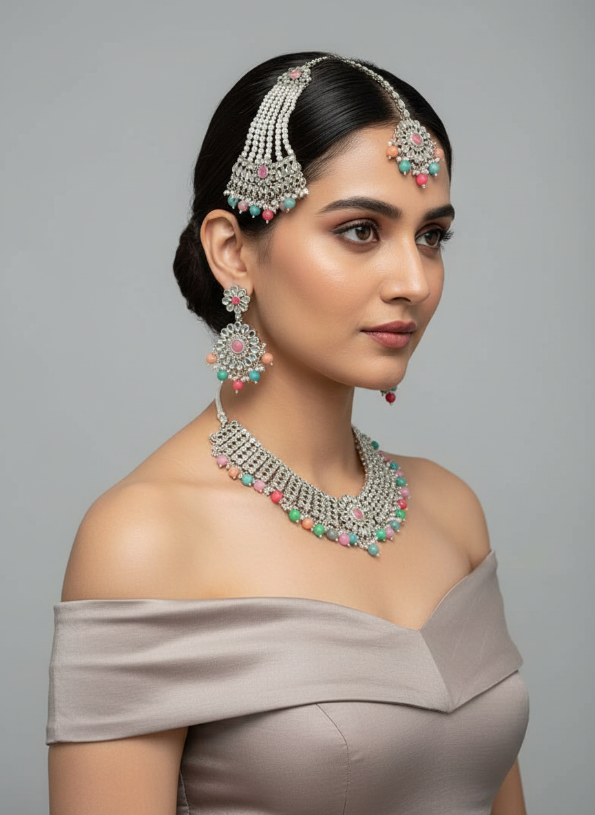 Woman wearing traditional jewelry with a gray background