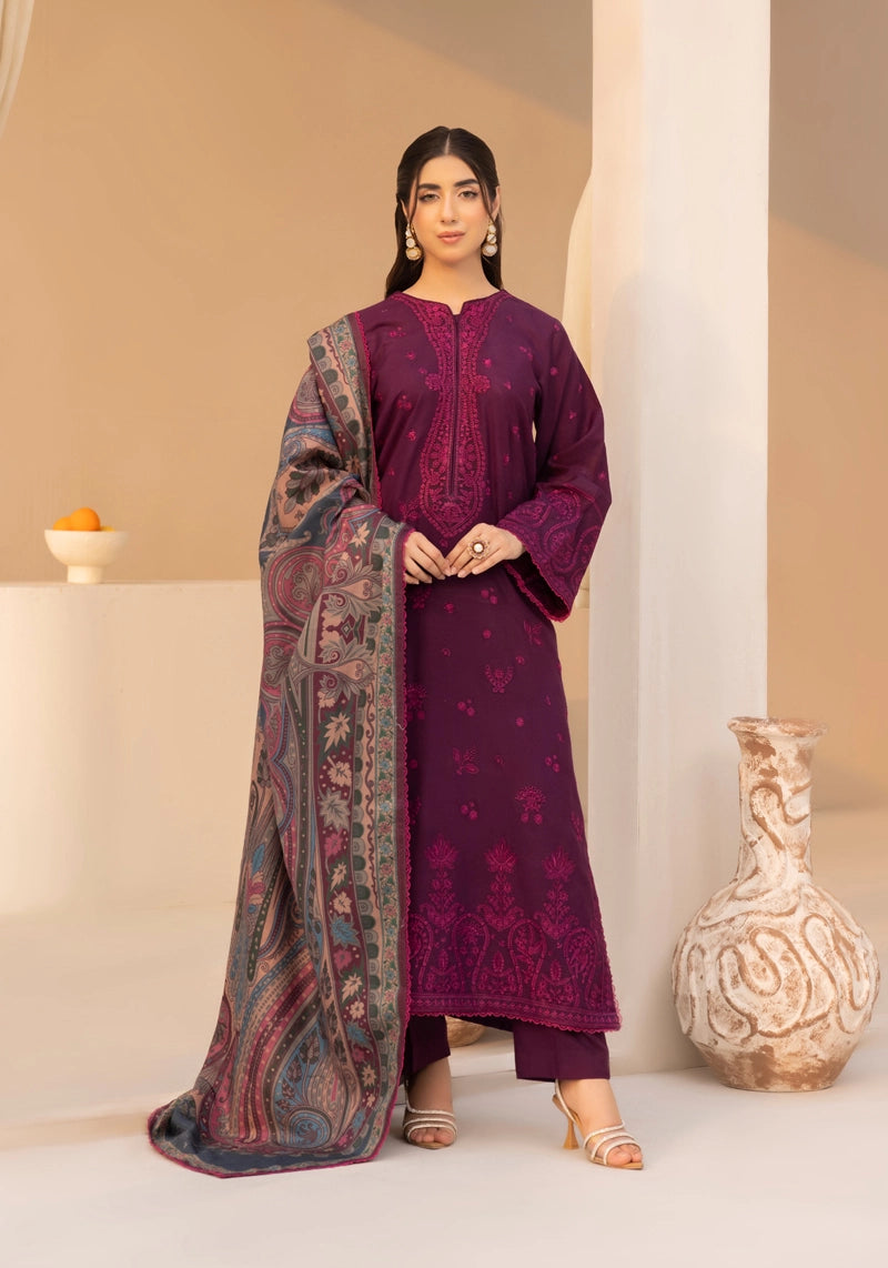 Woman in a purple traditional outfit with a matching dupatta in a minimalistic setting