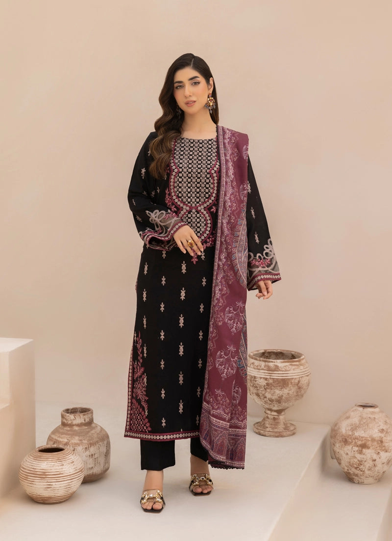 Woman in a black and purple embroidered outfit with decorative vases in the background