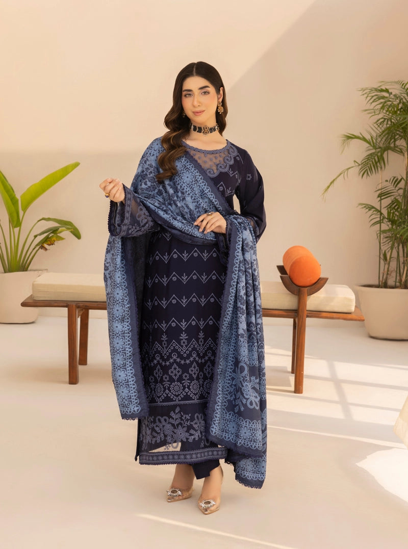 Woman holding a blue patterned scarf in a room with plants and a bench.