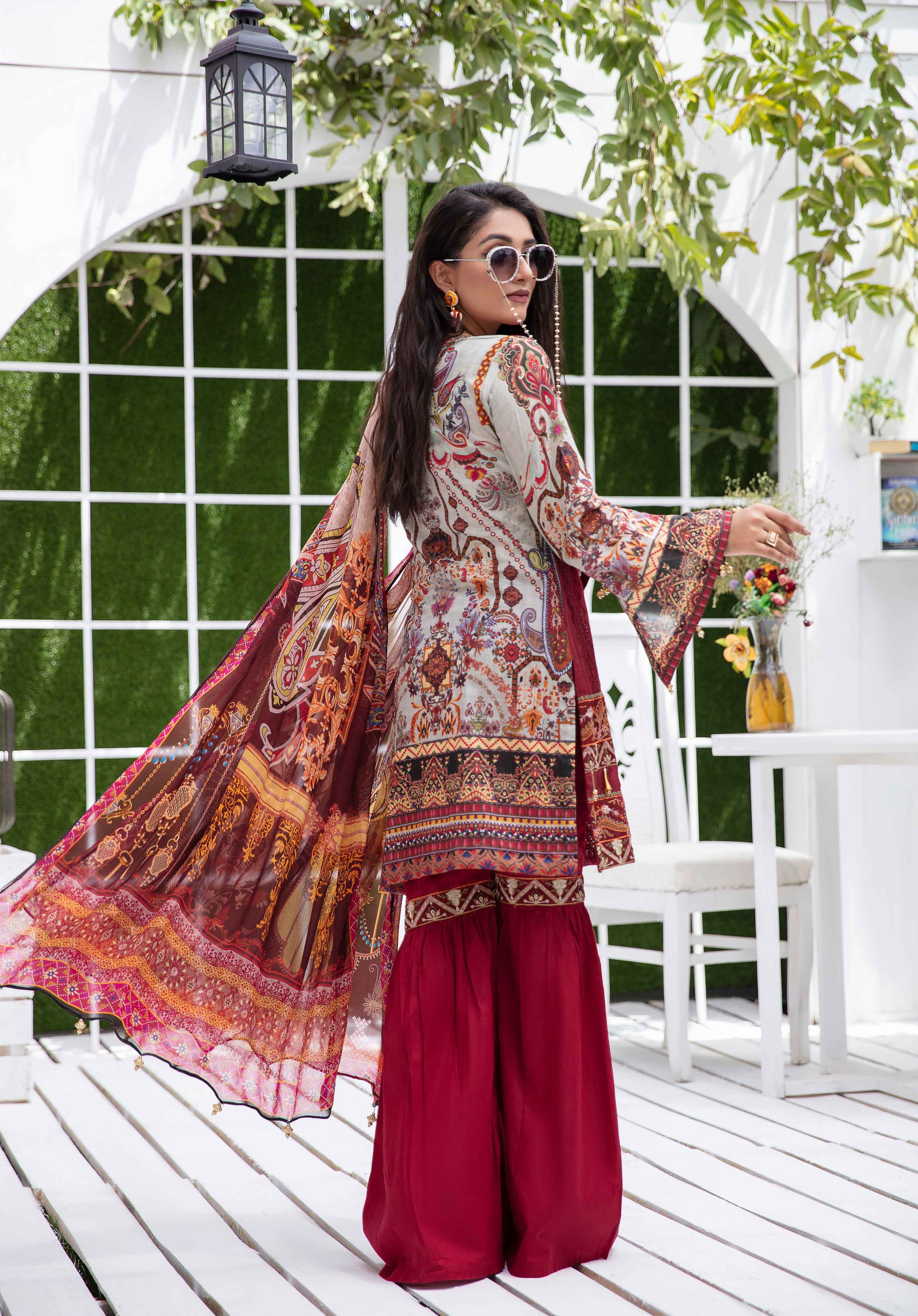 Pakistani gharara suit in colour maroon