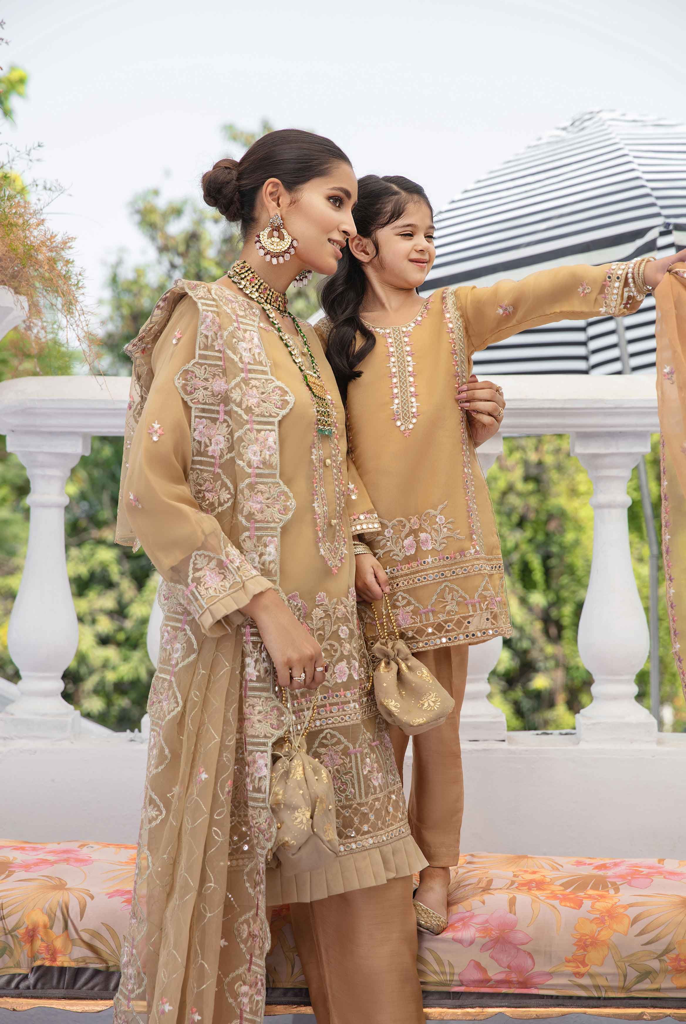 mother and daughter organza suit in colour gold